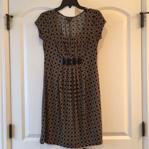 En Focus 6 Gold and black dress